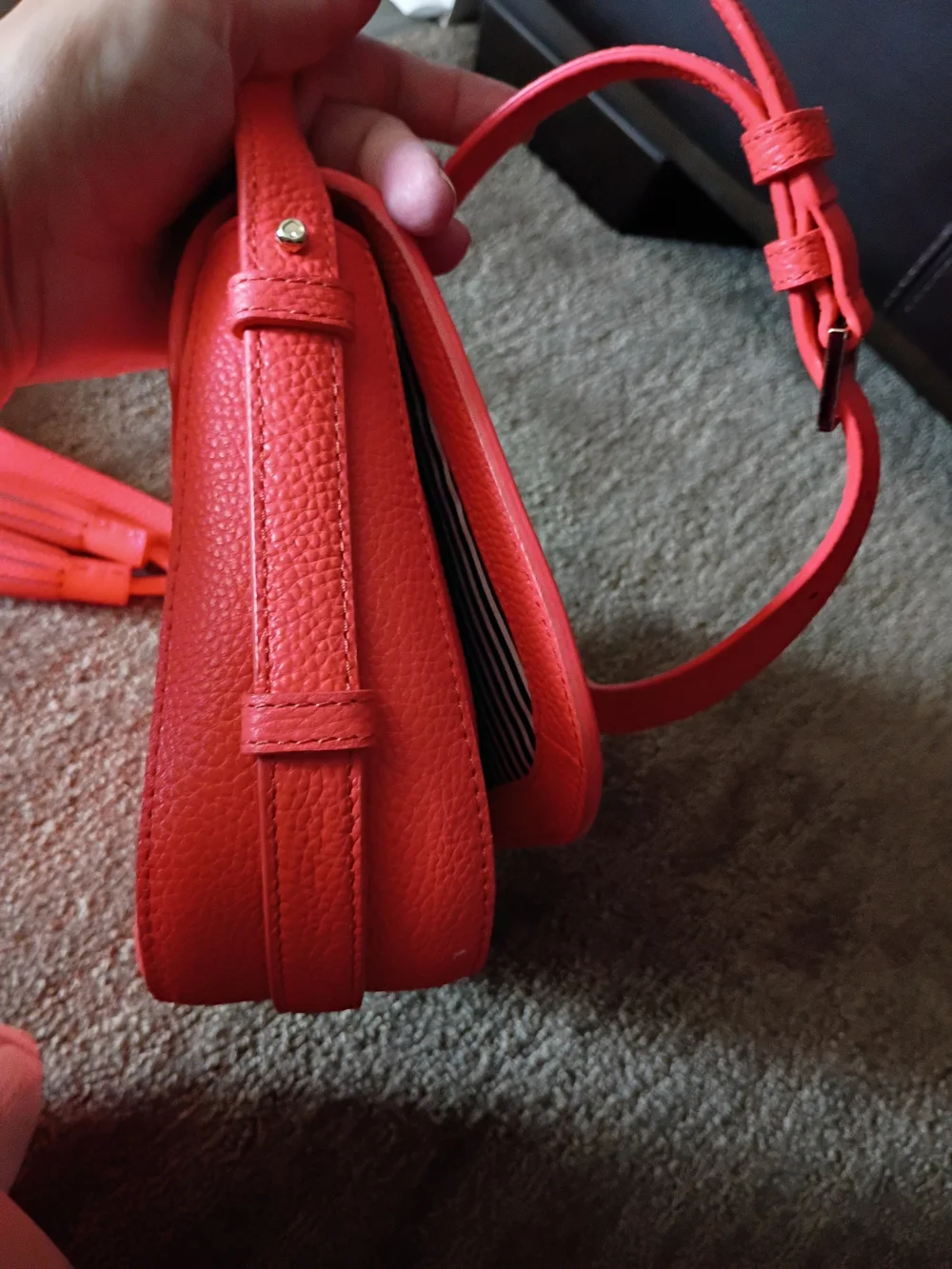 kate spade coral pebbled leather crossbody with tassel